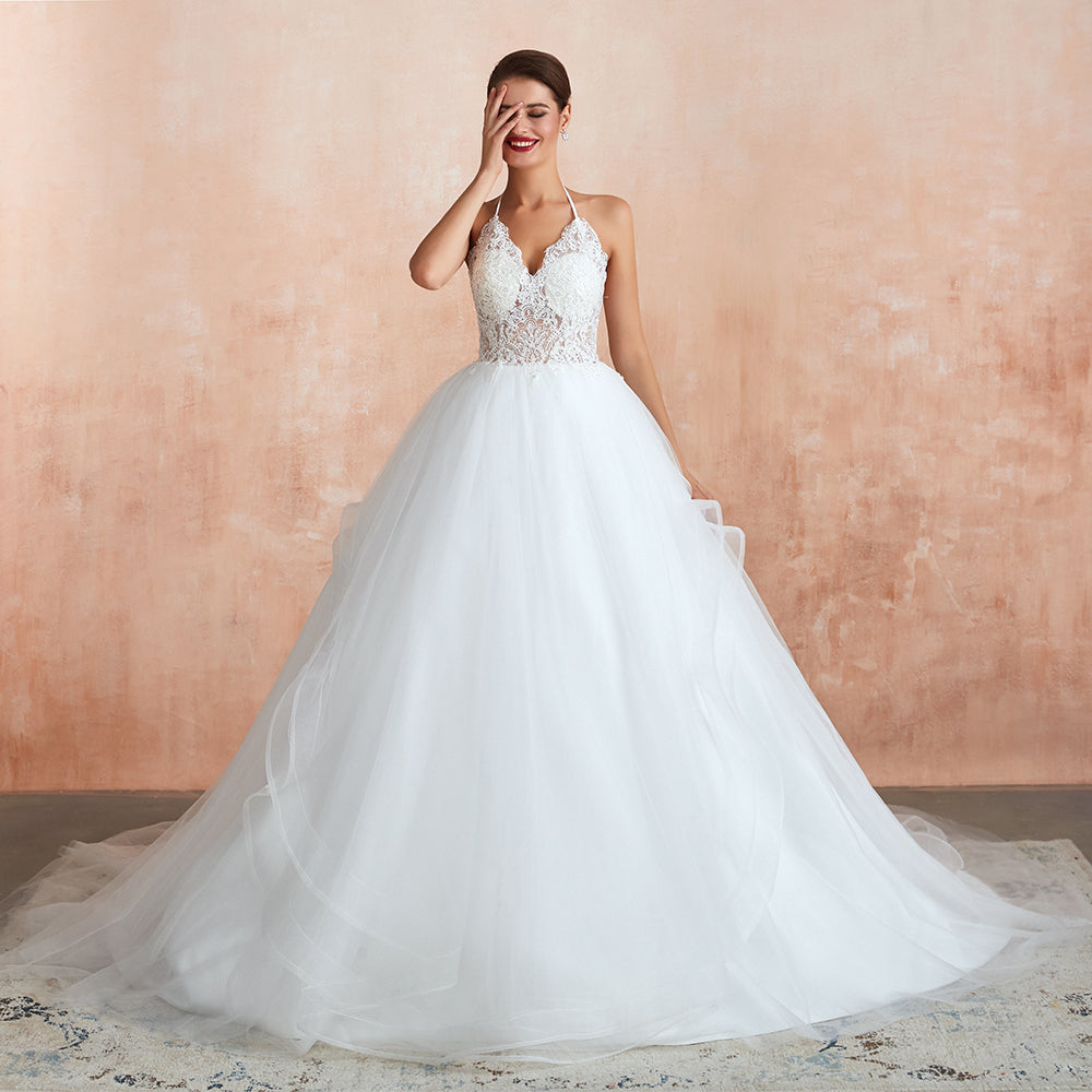 Robe de mariée longue en tulle, coupe trapèze, dos nu avec bretelles nouées et appliques