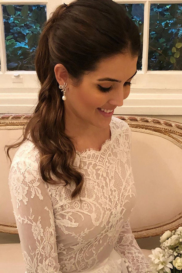 فستان زفاف طويل على شكل حرف أ من الدانتيل بأكمام