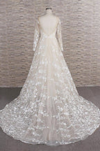 Robe de mariée longue en tulle, ligne A, décolleté cœur, ornée d'appliques, avec manches