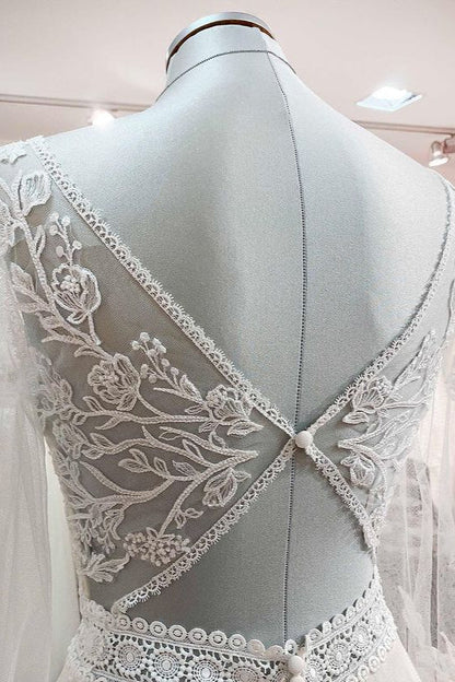 Langes A-Linien-Brautkleid mit Herzausschnitt, Tüll, Perlen und Spitzenapplikationen und Ärmeln