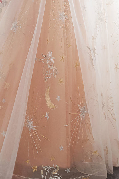 Vestidos de noche largos de tul con corte en A y espalda descubierta en color champán