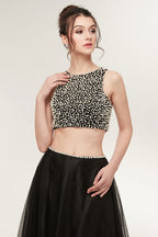 Abito da sera lungo a linea ad A in due pezzi con corpino senza maniche in tulle e perle