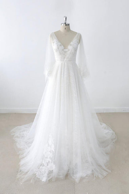 Vestido de novia largo de tul con escote en V, apliques de encaje y espalda descubierta con mangas