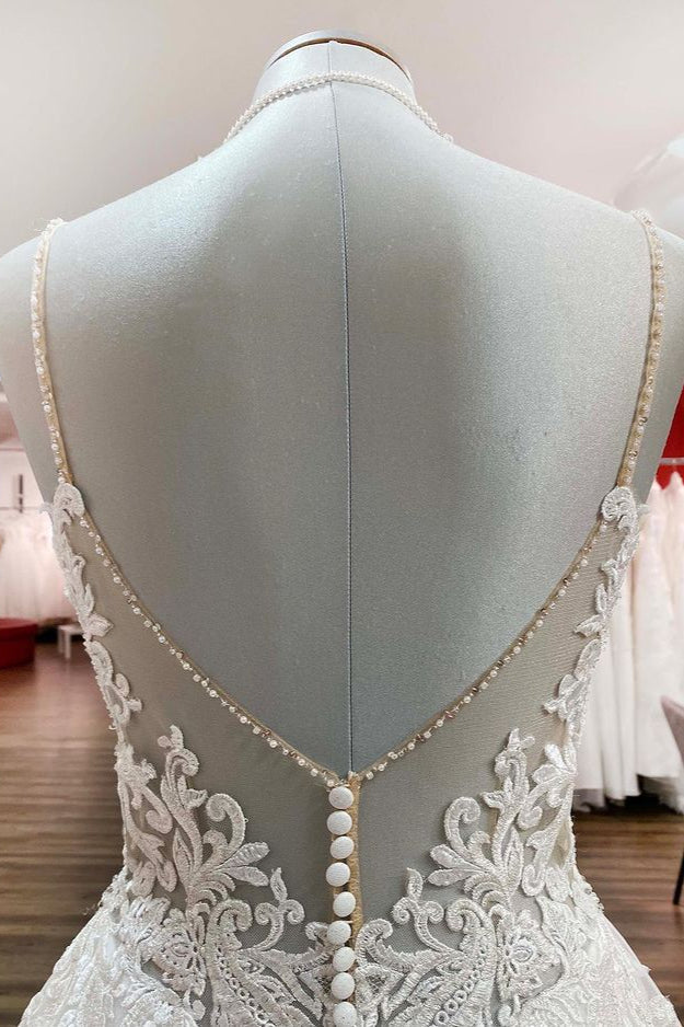 Robe de mariée longue en ligne A, décolleté en V, bretelles fines, dos nu avec dentelle
