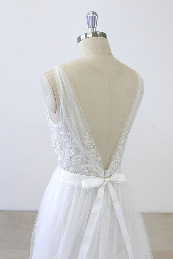 Robe de mariée longue en ligne A, col en V, décolleté cœur, volants appliqués, dos en tulle sans dos