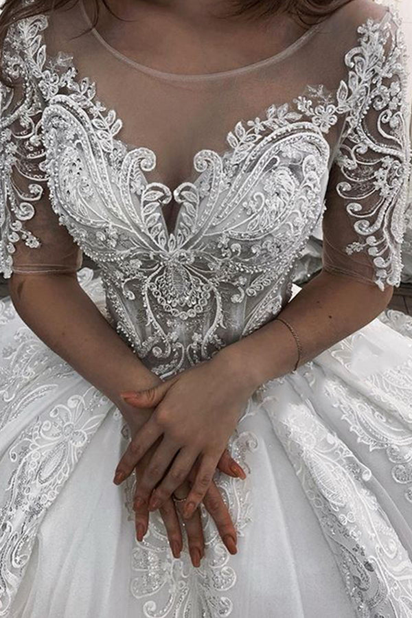 Abito da sposa lungo a palloncino con scollo a cuore, applicazioni in pizzo e tulle, con maniche