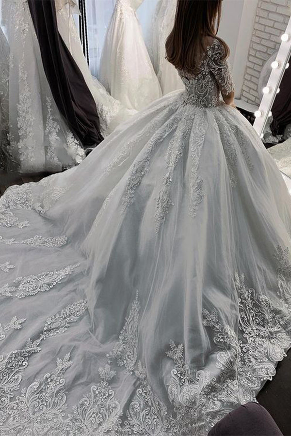 Abito da sposa lungo a palloncino con scollo a cuore, applicazioni in pizzo e tulle, con maniche