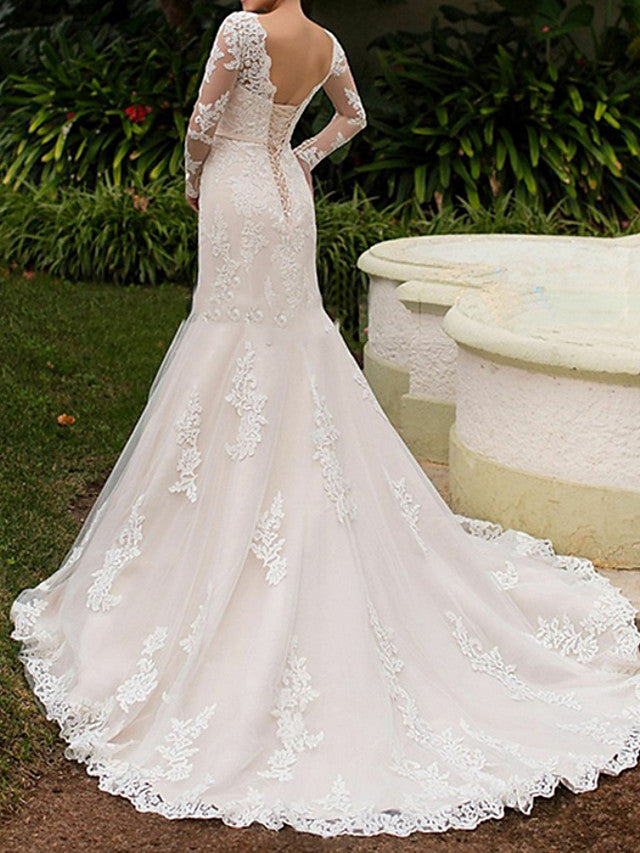 Vestido de novia largo de sirena con escote barco, cola de cepillo y encaje con mangas
