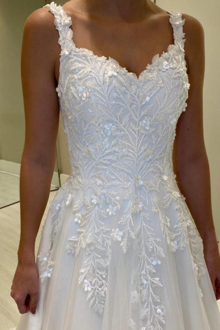 Robe de mariée blanche longue luxueuse en dentelle, ligne A, sans manches, décolleté cœur avec applications