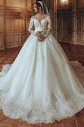 Robe de mariée luxueuse longue blanche en tulle et dentelle, col en U, coupe évasée, à manches longues
