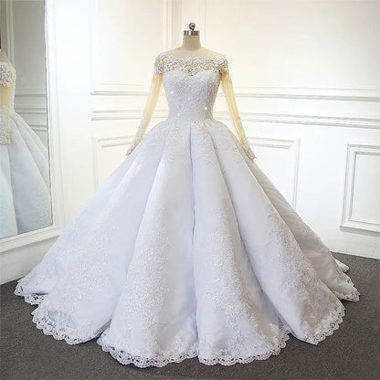 Luxuriöses weißes Prinzessinnen-Brautkleid in A-Linie mit langen Ärmeln und Spitze
