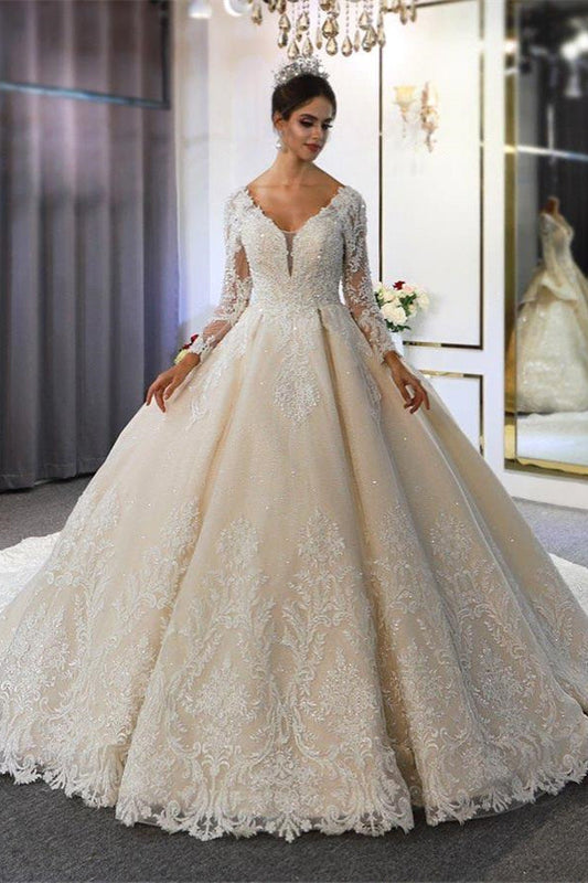 Robe de mariée de jardin luxueuse à manches longues et col en V profond 