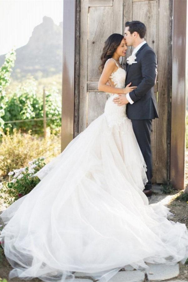 فستان زفاف عاجي برقبة قارب وقصة حورية البحر وتنورة قطار من التول