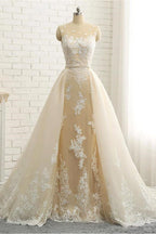 Vestidos de novia formales transparentes con escote joya, cola capilla, encaje, tul y satén con tirantes finos. 