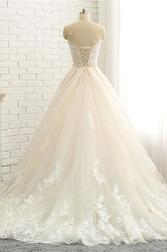 Vestidos de novia formales transparentes con escote joya, cola capilla, encaje, tul y satén con tirantes finos. 