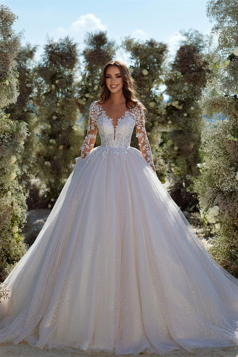 Vestido de novia moderno de corte A con apliques de tul y encaje, con mangas largas