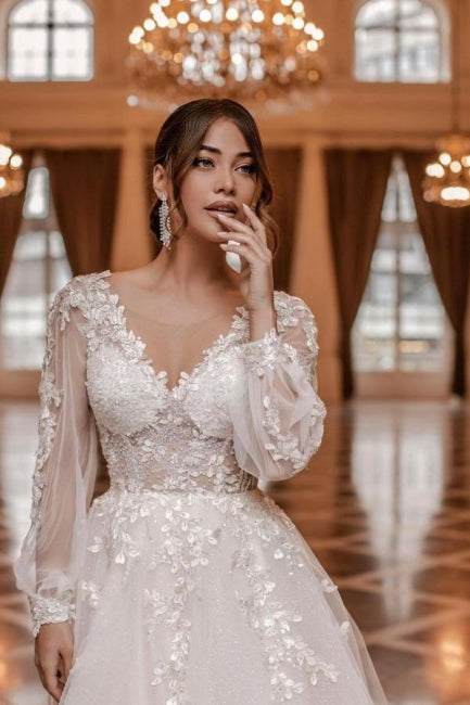 Vestidos de novia modernos de encaje con escote en V y manga larga