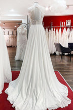 Vestido de novia modesto largo de gasa con apliques de joya y espalda abierta