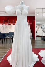 Vestido de novia modesto largo de gasa con apliques de joya y espalda abierta