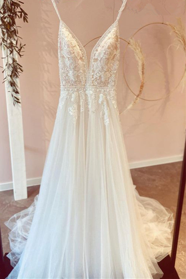 Vestido de novia modesto largo de corte A con escote en V, tirantes finos de tul y apliques de encaje