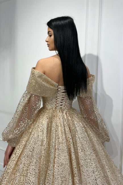 Abito da sera ossessionante oro a linea ad A con scollo a spalle scoperte e paillettes, maniche lunghe
