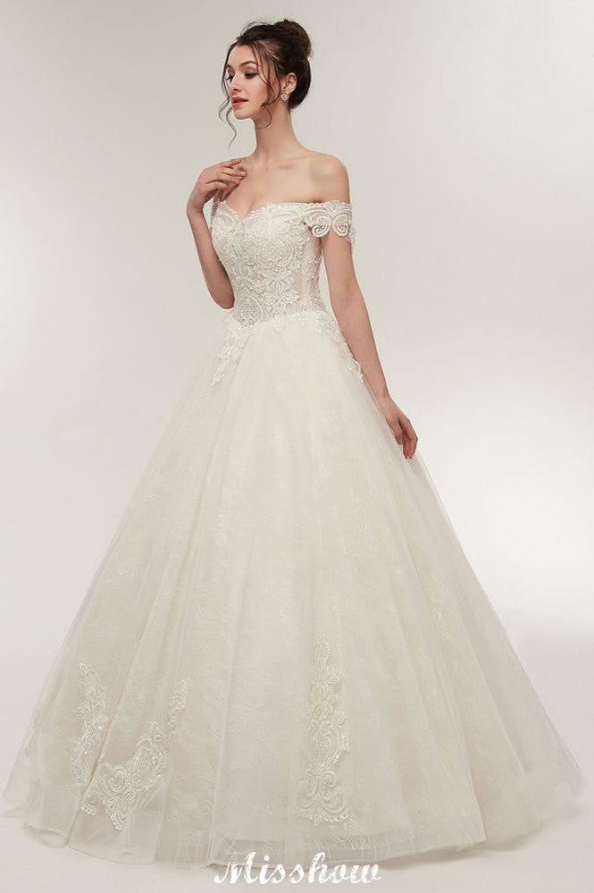 Abito da sposa con scollo a cuore, spalle scoperte, linea a trapezio, allacciatura, lunghezza fino a terra, pizzi applicati