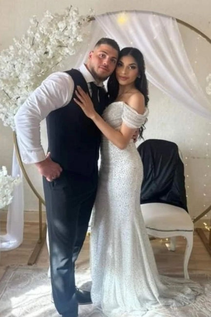 Robe de mariée longue jusqu'au sol à paillettes avec épaules dénudées style chapelle