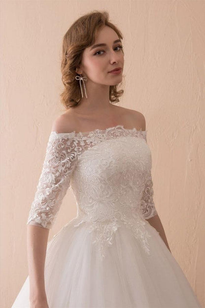 Vestido de novia de encaje con hombros descubiertos y mangas 1/2