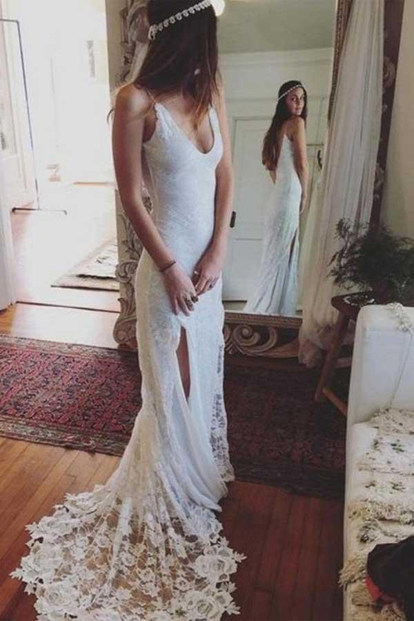 Vestido de novia con cola de corte, sin mangas, escote redondo y encaje en la espalda