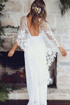 Vestido de novia de encaje con escote redondo y espalda descubierta y aberturas cruzadas