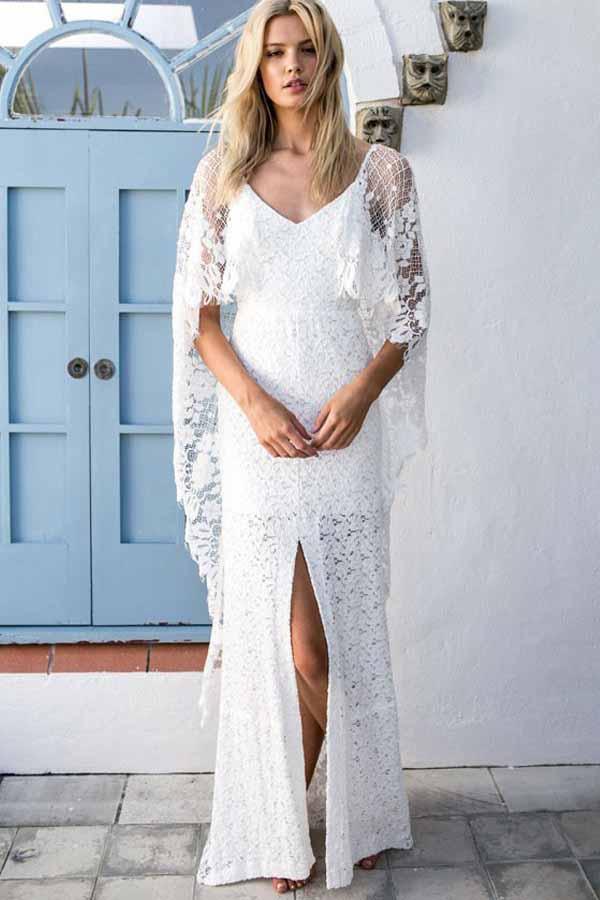 Vestido de novia de encaje con escote redondo y espalda descubierta y aberturas cruzadas