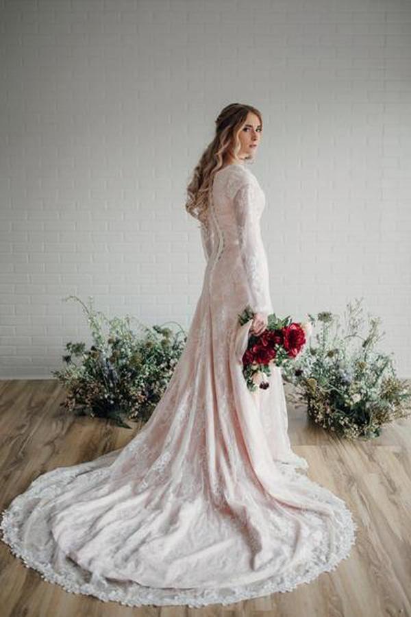 Vestido de novia modesto de encaje con mangas largas transparentes