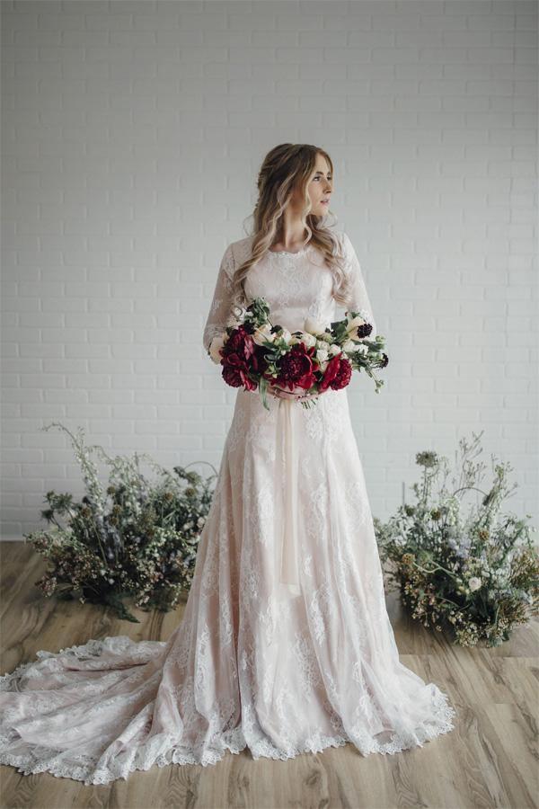 Vestido de novia modesto de encaje con mangas largas transparentes