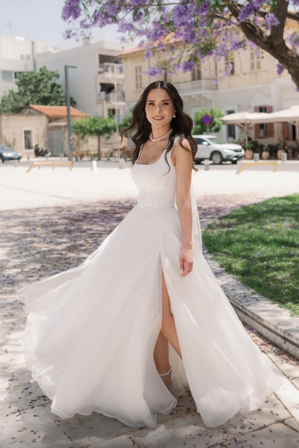 Robe de mariée simple longue ivoire en ligne A avec bretelles, tulle, sans manches et fente