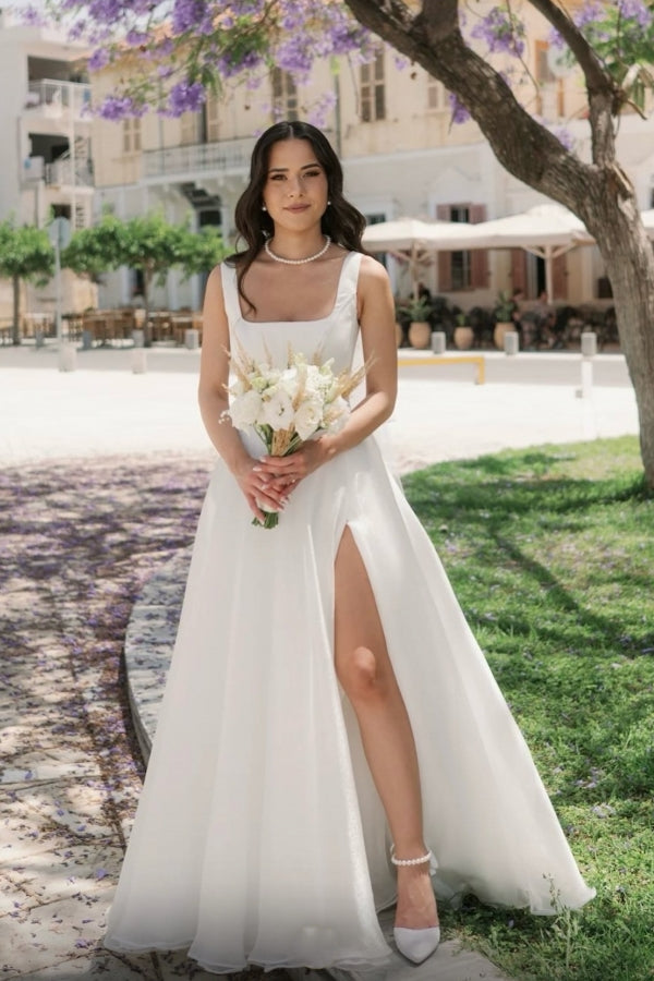 Robe de mariée simple longue ivoire en ligne A avec bretelles, tulle, sans manches et fente