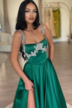 Splendido abito da sera lungo verde scuro a linea ad A senza maniche in raso con strass e spacco