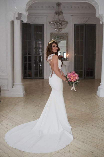 Impresionante vestido de novia de sirena sin mangas con encaje y botones con cremallera
