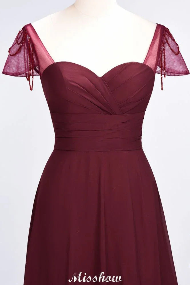 Vestido de dama de honor con volantes, manga corta tipo capa, largo hasta el suelo y abalorios Moher si la novia viste