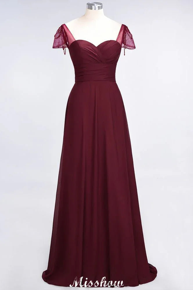 Vestido de dama de honor con volantes, manga corta tipo capa, largo hasta el suelo y abalorios Moher si la novia viste