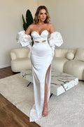 Abito da sera lungo bianco a sirena con spacco frontale e maniche, elegante e seducente