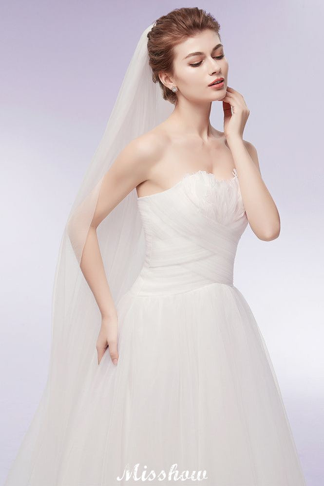 Vestidos de novia de tul con plumas, corte A y escote corazón sin tirantes
