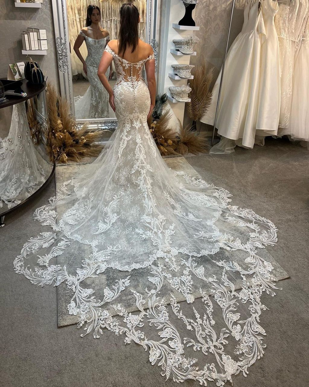 Trendy Floor Length Off-The-Shoulder Sleeveless Mermaid Lace Wedding Dress with Cathedral Train
