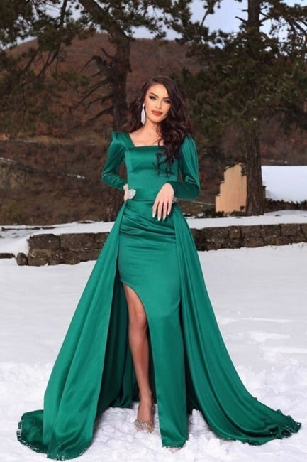 Vestidos de fiesta únicos de satén verde con mangas largas, corte A y volantes hasta el suelo.