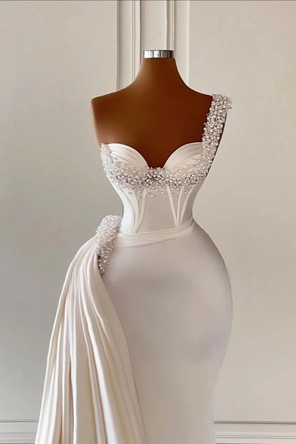 Vestidos de novia únicos color marfil con escote corazón, sin mangas, corte A y cuentas