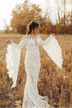 Einzigartiges, bodenlanges, herzförmiges, langärmliges Meerjungfrau-Brautkleid aus Spitze mit Kapellenschleppe 