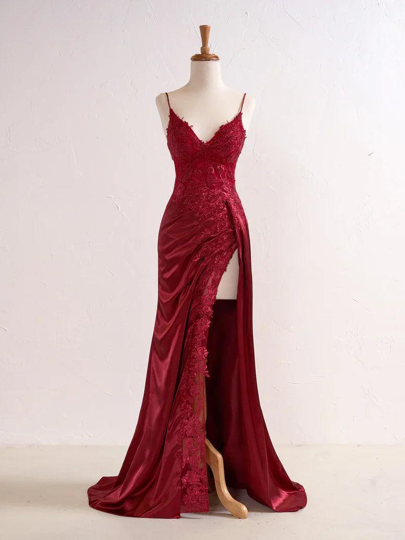 Abito da sera aderente nero lungo con applicazioni