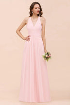 Robe longue de demoiselle d'honneur sans manches à col en V en mousseline rose pour mariage à la plage