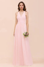 Robe longue de demoiselle d'honneur sans manches à col en V en mousseline rose pour mariage à la plage