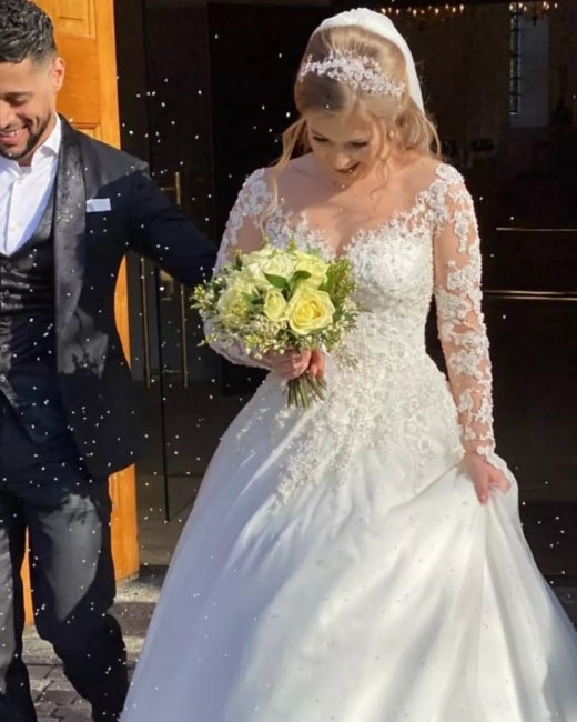 Vestidos de novia vintage de encaje con corte A y mangas