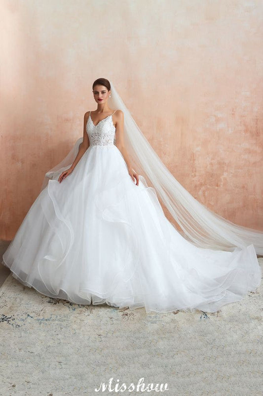 Vestido de novia blanco con cola de capilla, tirantes finos, transparente y con cordones, a la venta.